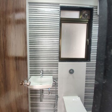 Bathroom in 2 BHK Apartment at Rajesh Mandir CHS, Malad West – for Rent