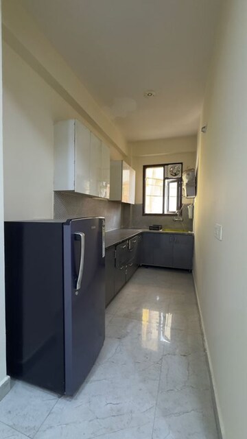 Kitchen in 2 BHK Builder Floor at Palm Residency Chhatarpur, Rajpur Khurd Extension – for Rent