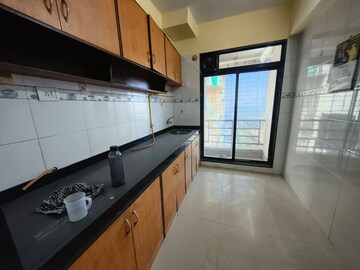 Kitchen in 3 BHK Apartment at Gajra Bhoomi Heights, Kharghar – for Rent