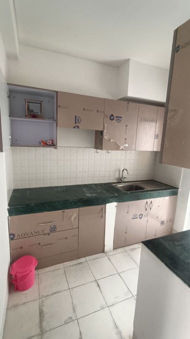 Kitchen, bptp-park-elite-floors 3 Bedroom 1032 Sq.Ft. Builder Floor In Sector 85 Faridabad 9977755