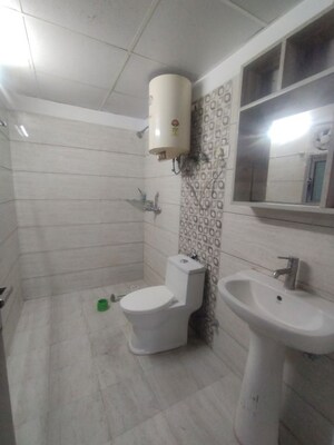 Bathroom in 3 BHK Apartment at Gulshan Bellina, Sector 16 Greater Noida – for Rent