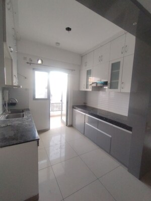 Kitchen in 3 BHK Apartment at Gulshan Bellina, Sector 16 Greater Noida – for Rent