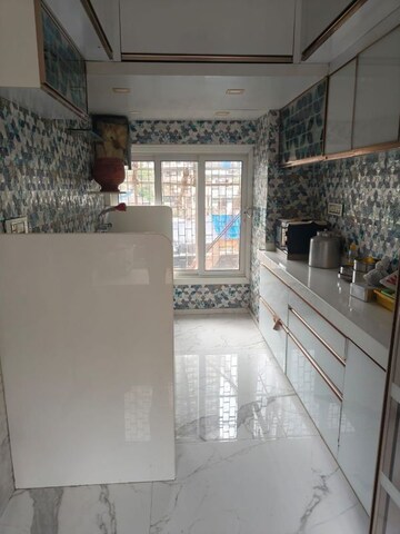 Kitchen in 2 BHK Apartment at Bhavani CHS, Dadar West – for Rent