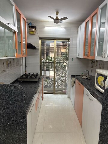 Kitchen in 2 BHK Apartment at Rohit Apartments, Lokhandwala Complex – for Rent