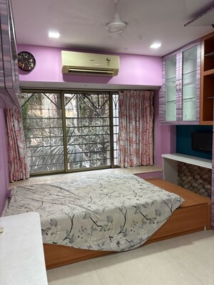 Bedroom in 2 BHK Apartment at Rohit Apartments, Lokhandwala Complex – for Rent