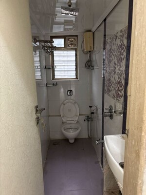 Bathroom in 2 BHK Apartment at Rohit Apartments, Lokhandwala Complex – for Rent
