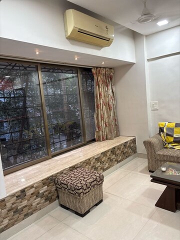 Living Room in 2 BHK Apartment at Rohit Apartments, Lokhandwala Complex – for Rent