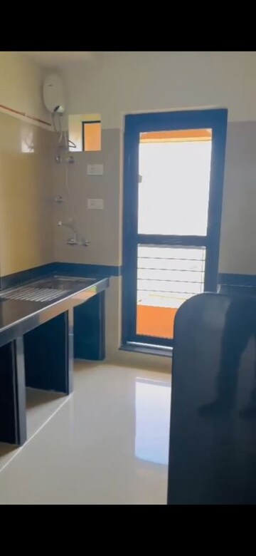 Kitchen in 2 BHK Apartment at Raheja Interface Heights, Malad West – for Rent