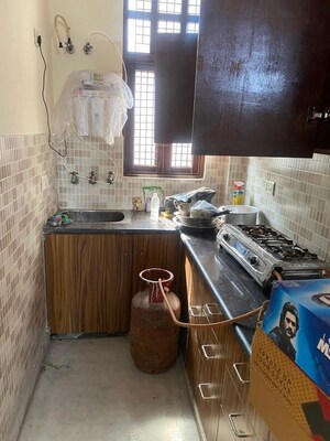 Kitchen in 2 BHK Builder Floor at Rohini Sector 25 – for Rent