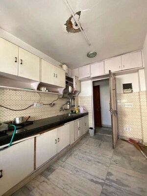 Kitchen in 2 BHK Apartment at Kailash Colony – for Rent