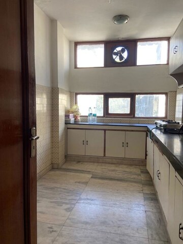 Kitchen in 2 BHK Apartment at Kailash Colony – for Rent