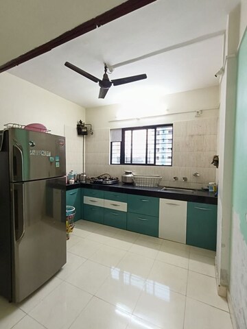 Kitchen in 2 BHK Apartment at Laxmi Ganga Residency Apartment, Anand Nagar – for Sale