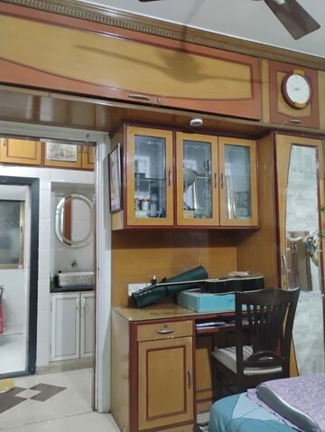 Living Room in 2 BHK Apartment at Twinkle Towers CHS, Kailash Nagar – for Sale