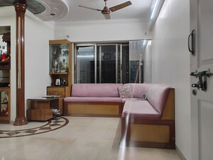 Living Room in 2 BHK Apartment at Twinkle Towers CHS, Kailash Nagar – for Sale