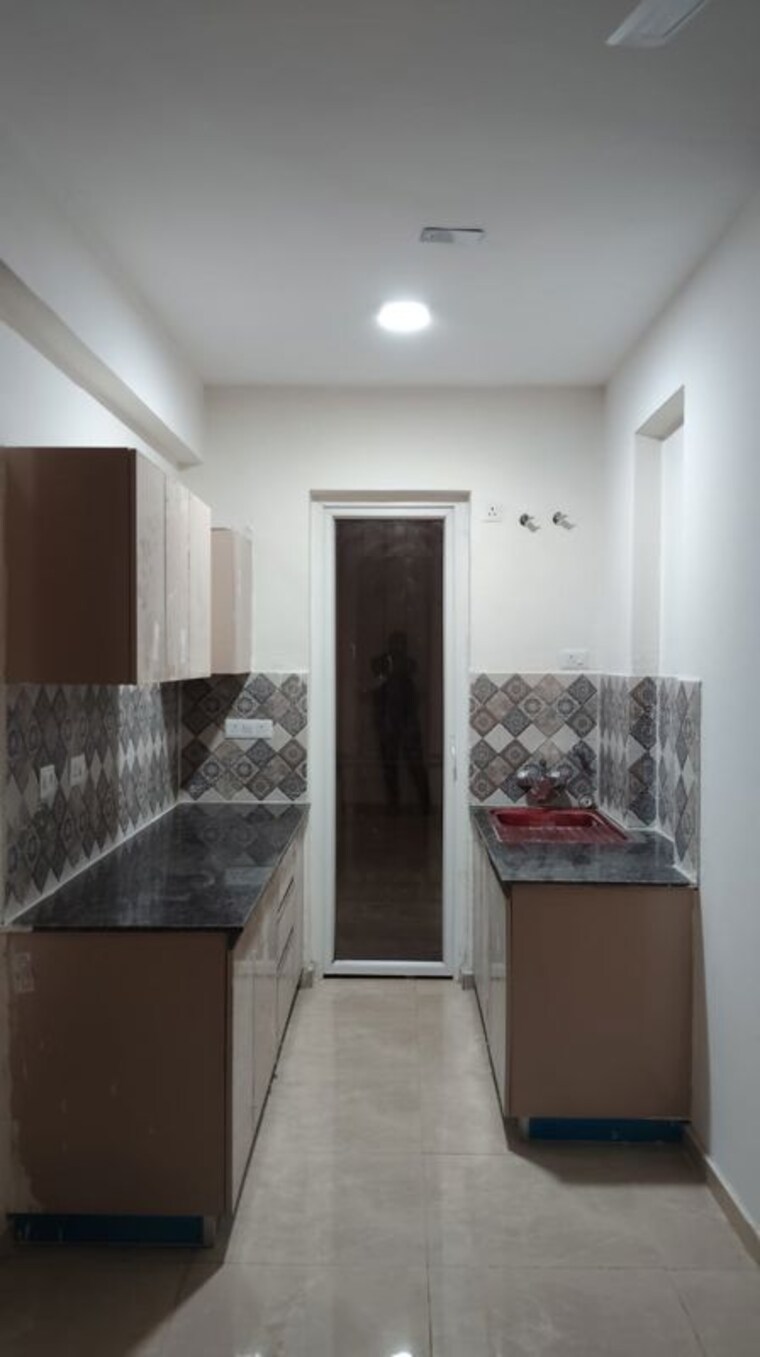 Kitchen, signature-global-park-4-and-5 3 Bedroom 1120 Sq.Ft. Builder Floor In Sohna Sector 36 Gurgaon 9978995