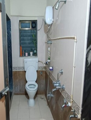 Bathroom in 1 BHK Apartment at Keshar Upvan, Gawand Baug – for Rent