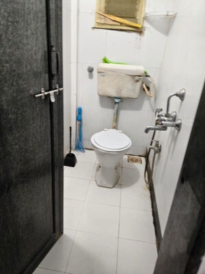 Bathroom in 1 BHK Apartment at Shriram Nagar CHS, Aundh – for Rent
