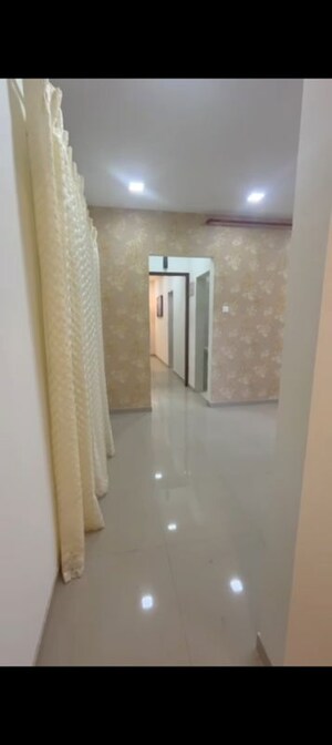 Building Lobby in 2 BHK Apartment at Puranik Rumah Bali, Ghodbunder Road – for Sale