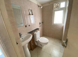 Bathroom in 2 BHK Builder Floor at Wave Executive Floors, Wave City – for Rent