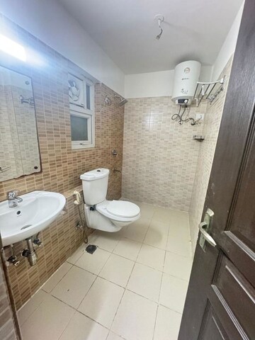 Bathroom in 3 BHK Apartment at 3C Lotus Zing, Sector 168 – for Rent