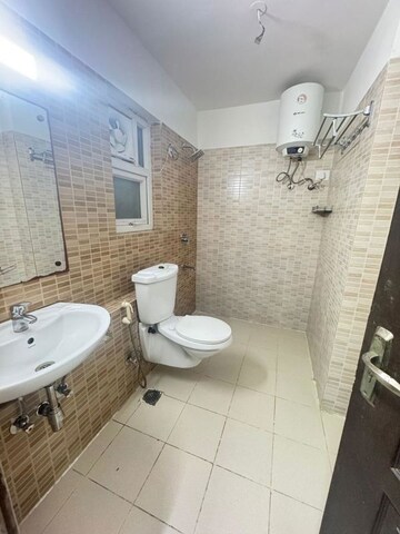 Bathroom in 3 BHK Apartment at 3C Lotus Zing, Sector 168 – for Rent