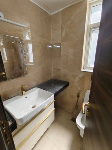 Bathroom in 3 BHK Apartment at Smart World Orchard, Sector 61 – for Rent