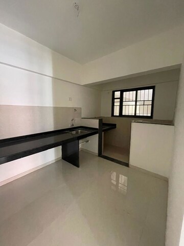Kitchen in 2.5 BHK Apartment at Kohinoor Viva City, Dhanori – for Sale