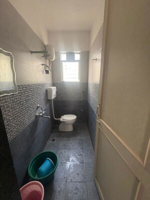 Bathroom in 2 BHK Apartment at Bunty Mayur Kilbil, Dhanori – for Rent