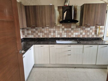 Kitchen in 4 BHK Apartment at Jaypee Greens Kalypso Court, Sector 128 – for Rent