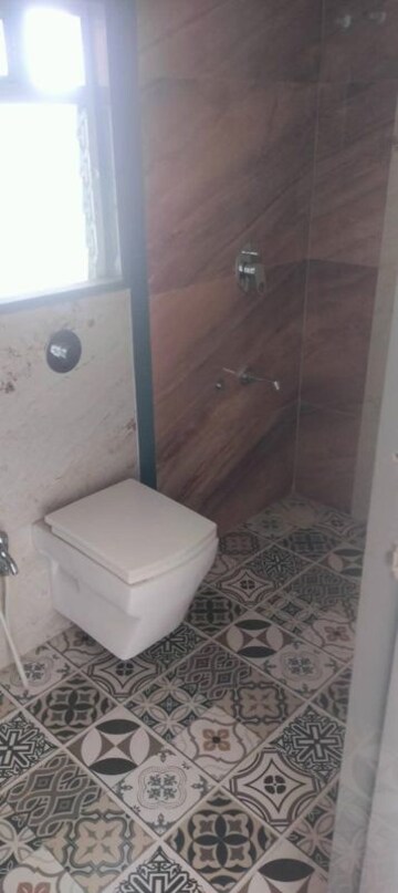 Bathroom in 2 BHK Apartment at Runwal Gardens, Dombivli East – for Rent