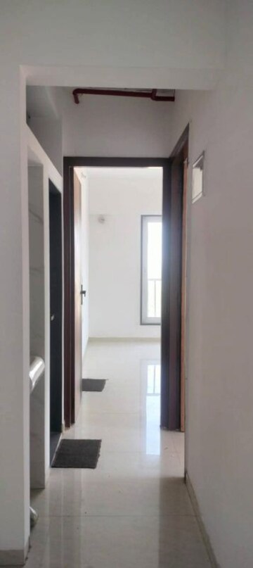 Building Lobby in 2 BHK Apartment at Ajmera Crosstown One, Kalyan West – for Rent