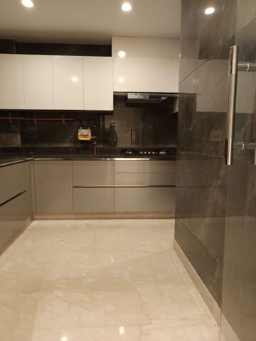 Kitchen in 4 BHK Builder Floor at DLF Queens Court, Greater Kailash ii – for Sale