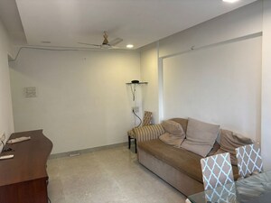 Living Room in 1 BHK Apartment at Sai Darshan Building, Kemps Corner – for Rent