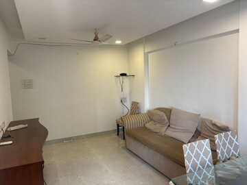 Living Room in 1 BHK Apartment at Sai Darshan Building, Kemps Corner – for Rent