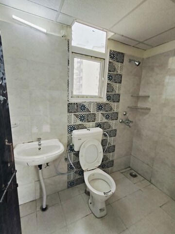 Bathroom in 2 BHK Apartment at Signature Global Proxima, Sector 89 – for Rent