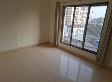 Room in 2 BHK Apartment at Vardhman Grandeur, Andheri West – for Rent