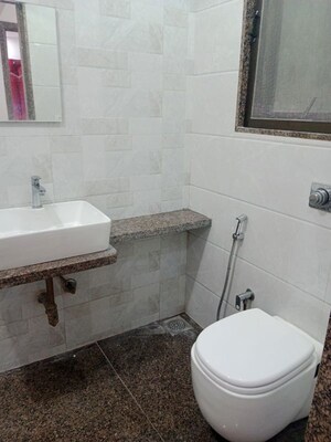 Bathroom in 2 BHK Apartment at Neminath Palace, Santacruz East – for Rent