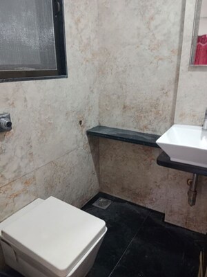 Bathroom in 2 BHK Apartment at Neminath Palace, Santacruz East – for Rent