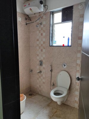 Bathroom in 2 BHK Apartment at Kwality Vrindavan Heights, Hadapsar – for Rent