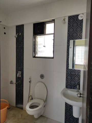 Bathroom in 2 BHK Apartment at Kwality Vrindavan Heights, Hadapsar – for Rent