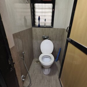 Bathroom in 1 BHK Apartment at Redwoods CHS, Ghati Pada – for Rent