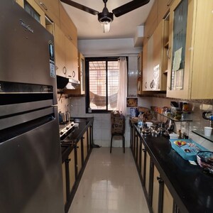 Kitchen in 1 BHK Apartment at Redwoods CHS, Ghati Pada – for Rent