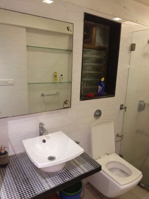 Bathroom in 3 BHK Apartment at Evershine Embassy, Andheri West – for Rent