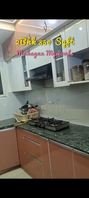 Kitchen in 3 BHK Apartment at Mahagun Mywoods, Sector 16c Greater Noida – for Rent