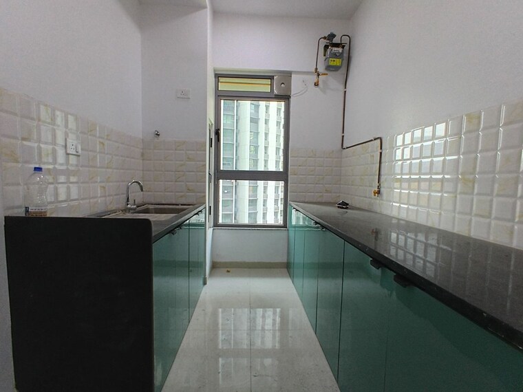 Kitchen, kalpataru-immensa-f 1 Bedroom 450 Sq.Ft. Apartment In Kolshet Road Thane 9979898
