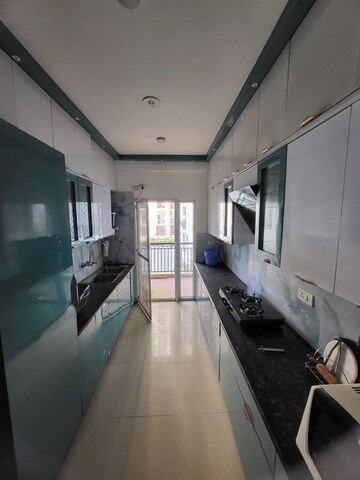 Kitchen in 3 BHK Apartment at Antriksh Golf View, Sector 78 – for Rent