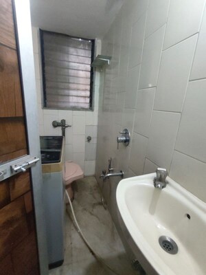 Bathroom in 2 BHK Apartment at Shiv Om CHS, Chandivali – for Rent