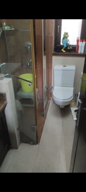 Bathroom in 4 BHK Apartment at Vasant Kunj – for Rent