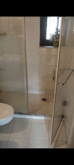 Bathroom in 4 BHK Apartment at Vasant Kunj – for Rent