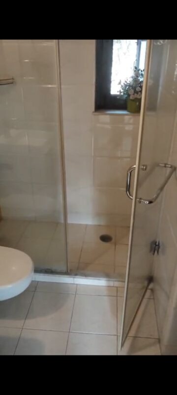 Bathroom in 4 BHK Apartment at Vasant Kunj – for Rent